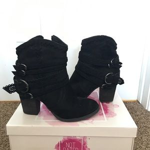 Women’s short black suede buckle boots